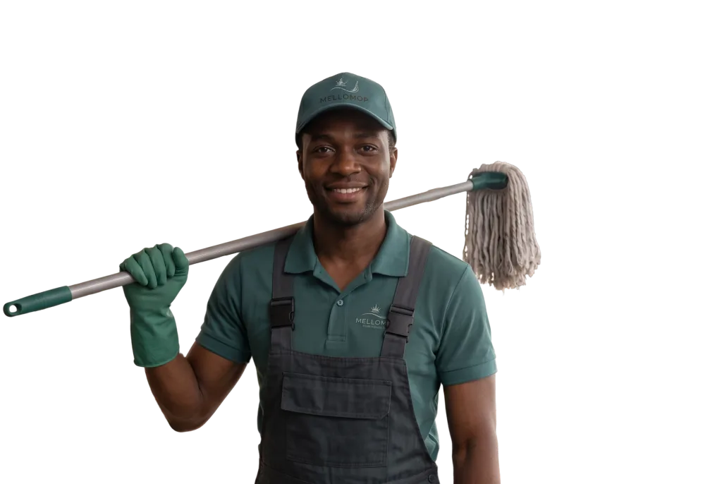MelloMop cleaner resting a mop on his shoulder